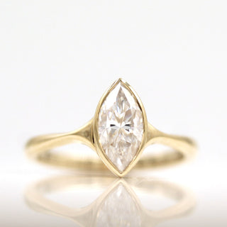 Vintage-inspired three-stone moissanite engagement rings