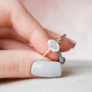 Halo gemstone engagement ring