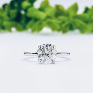 round-cut-solitaire-moissanite-engagement-ring