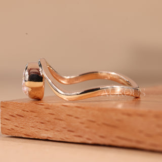 1.0CT East-West Pear Cut Bezel Set Curved Solitaire Engagement Ring