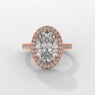 modern oval engagement ring, oval cut diamond with side stones, oval diamond three stone ring, oval cut diamond ring setting, oval diamond prong setting, luxury oval diamond ring