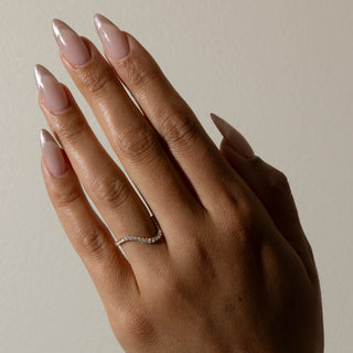 0.13TCW Round Cut Pave Set Curved Moissanite Wedding Band