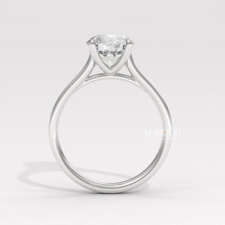 gold twisted band with diamond, modern round diamond ring, round diamond split shank ring, petite round diamond ring, artistic round cut ring design, luxury round cut gold ring, round diamond ring for her, gold engagement ring classic style