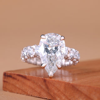 pear diamond engagement ring, pear shaped diamond ring, gold pear diamond ring, pear cut diamond engagement ring
