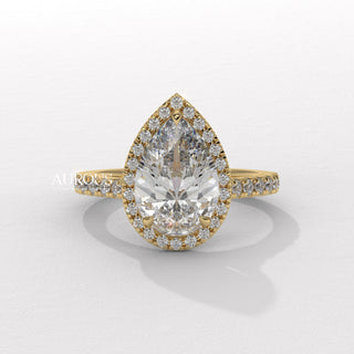 pear cut diamond with side stones, pear diamond three stone ring, pear shaped diamond gold band, custom pear diamond ring, modern pear engagement ring, pear cut diamond prong setting, pear diamond ring setting