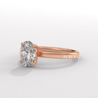  elegant oval diamond ring, oval diamond ring for her, oval cut diamond gold band, custom oval diamond ring, modern oval engagement ring, oval cut diamond with side stones, oval diamond three stone ring, oval cut diamond ring setting