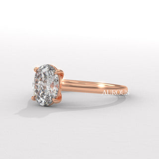  elegant oval diamond ring, oval diamond ring for her, oval cut diamond gold band, custom oval diamond ring, modern oval engagement ring, oval cut diamond with side stones, oval diamond three stone ring, oval cut diamond ring setting