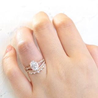 Moissanite engagement rings with asymmetrical detailing