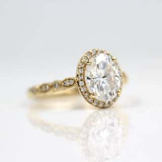 Moissanite solitaire engagement rings with diamond accents