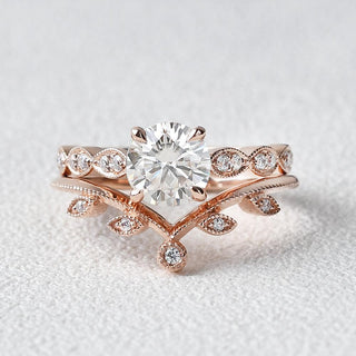 Vintage-inspired engraved moissanite engagement rings with yellow gold
