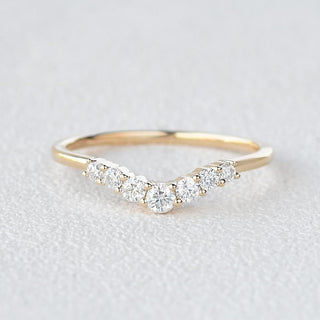 Moissanite engagement rings with minimalist engraved motifs