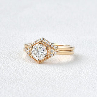 Vintage-inspired engraved moissanite engagement rings with rose gold