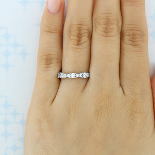 Petite moissanite engagement ring