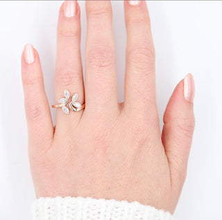 Vintage-inspired halo moissanite engagement rings with rose gold