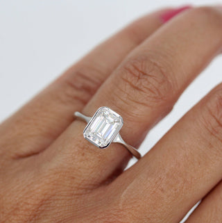 Moissanite engagement ring with side stones