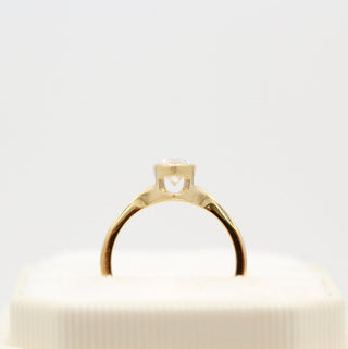 Vintage-inspired engraved moissanite engagement rings