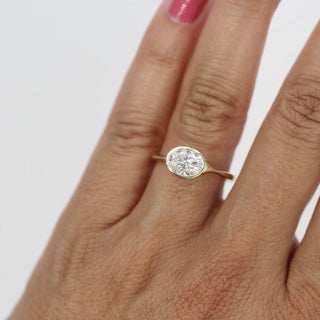 Vintage-inspired solitaire moissanite engagement rings with accents