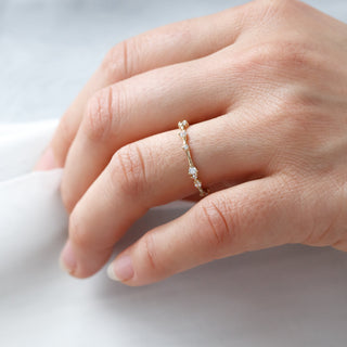Moissanite engagement rings with minimalist swirl