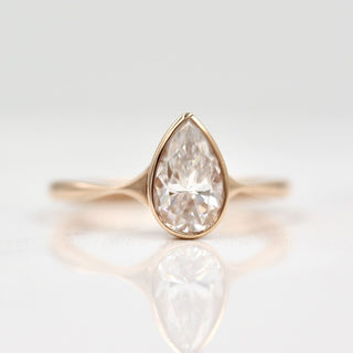 Three-stone moissanite engagement rings