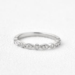 Moissanite engagement rings with minimalist sculptural elements