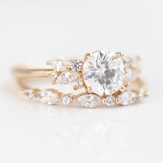 Moissanite engagement rings with minimalist intertwined bands
