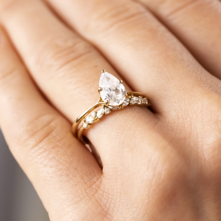 Moissanite engagement rings with minimalist open gallery style