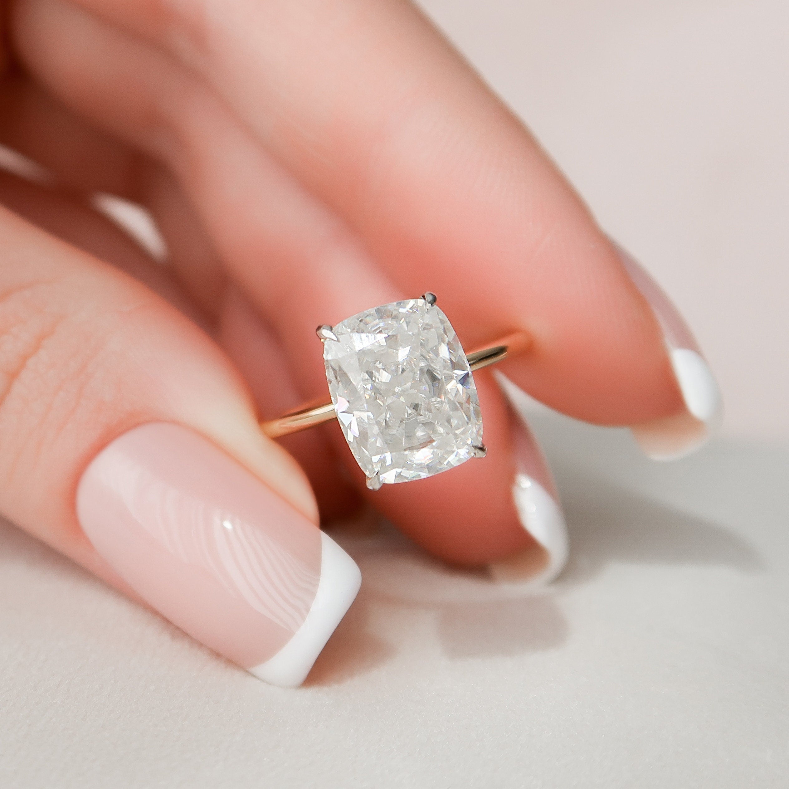 Cushion cut clearance with hidden halo